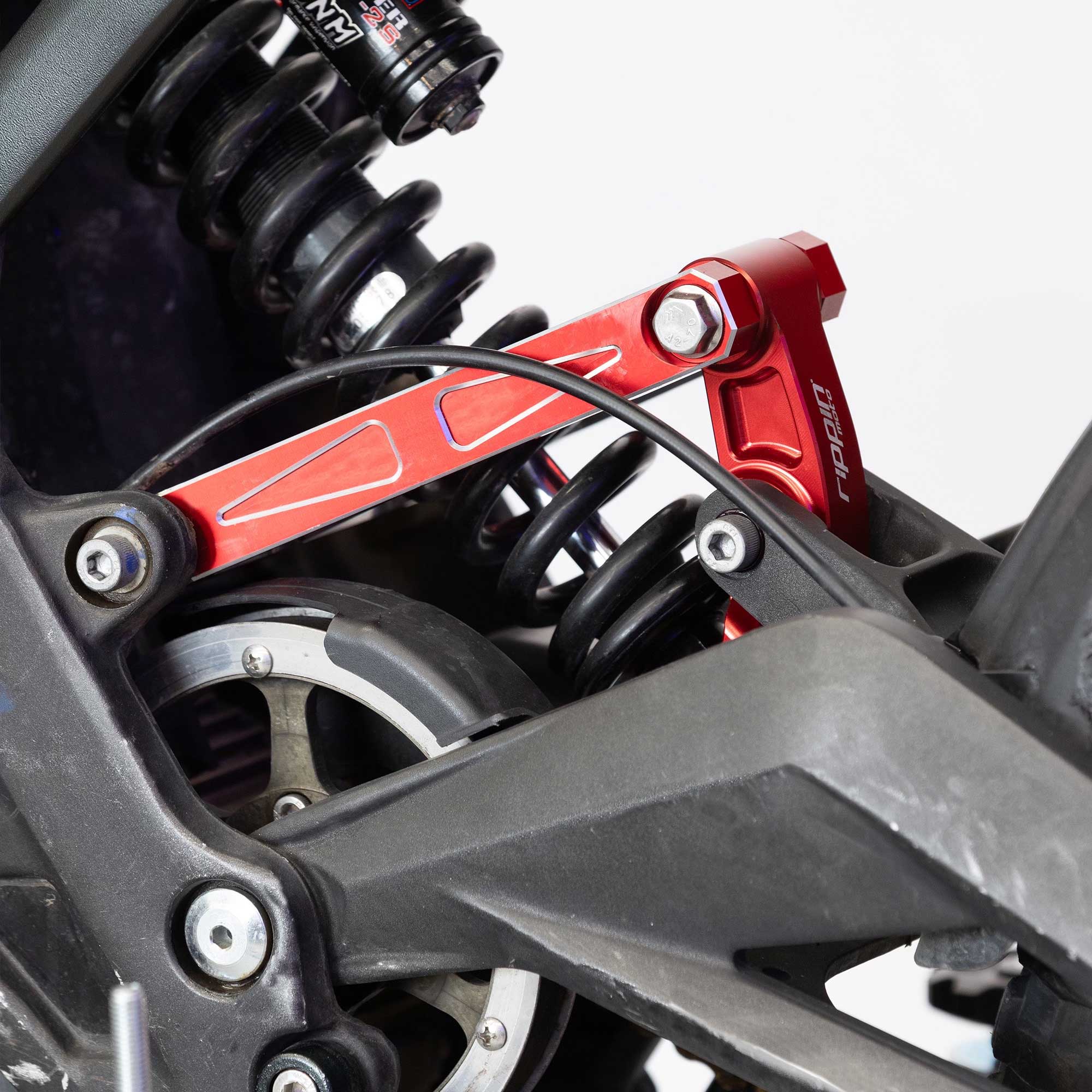 Photo of Rear Suspension Linkage Kit for Sur-Ron LBX by Rippin Moto - Premium Suspension for UTVs / Side by Sides