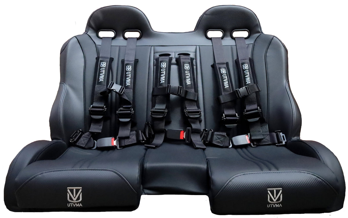 Black three-person bench seat with four-point harnesses