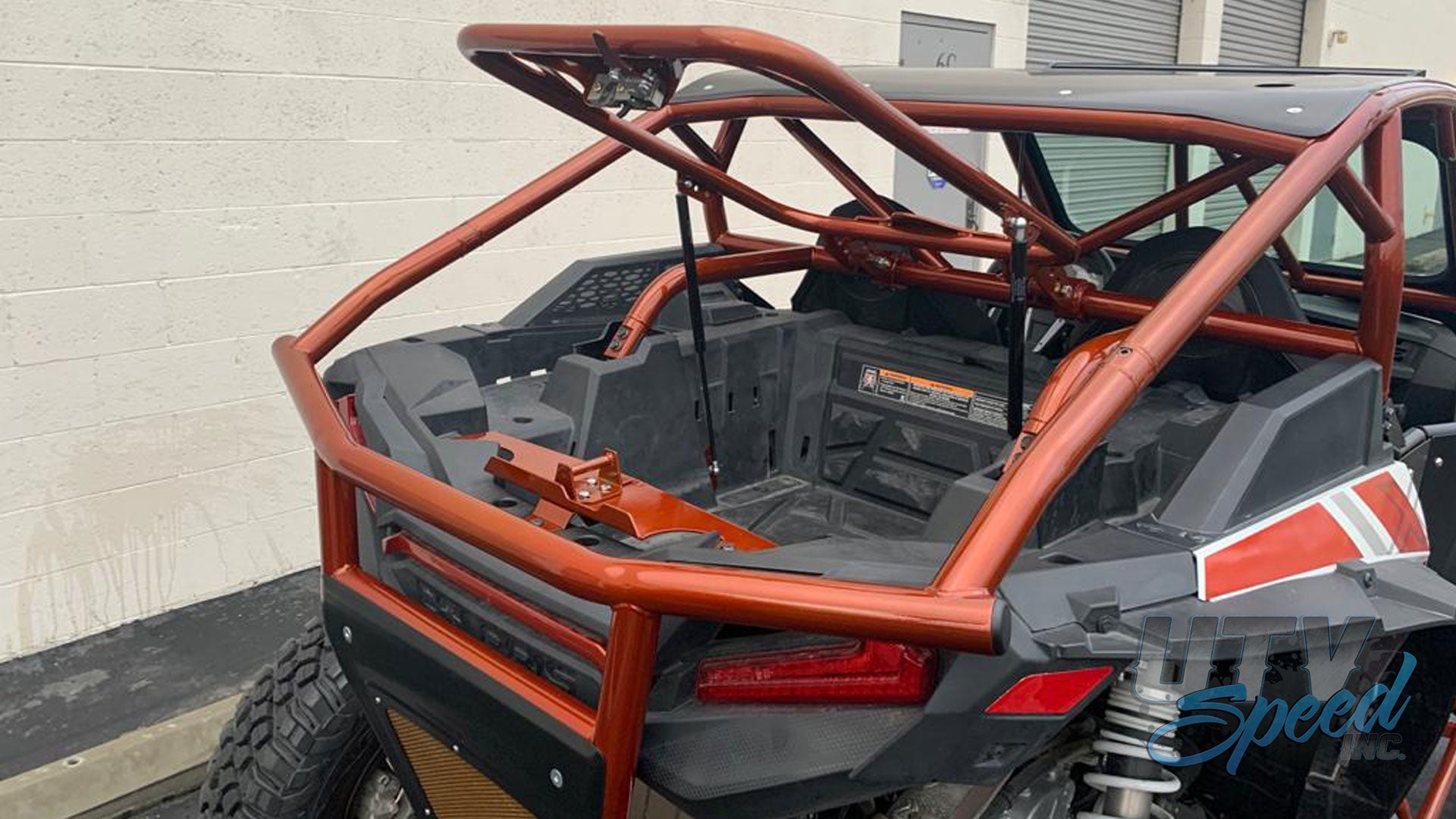 Photo of Opening Spare Tire Mount with shocks for the Polaris RZR 1000 by UTV Speed by UTV SPEED - Premium Accessories for UTVs / Side by Sides