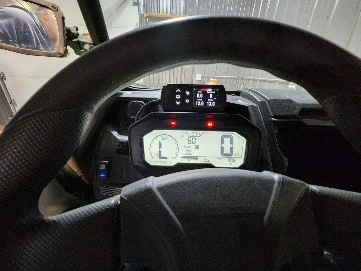 Kawasaki KRX 1000 PV3 mount installed behind gauge cluster