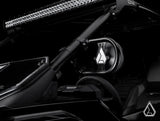 Assault Insurgent mirror mounted below a UTV roof light bar