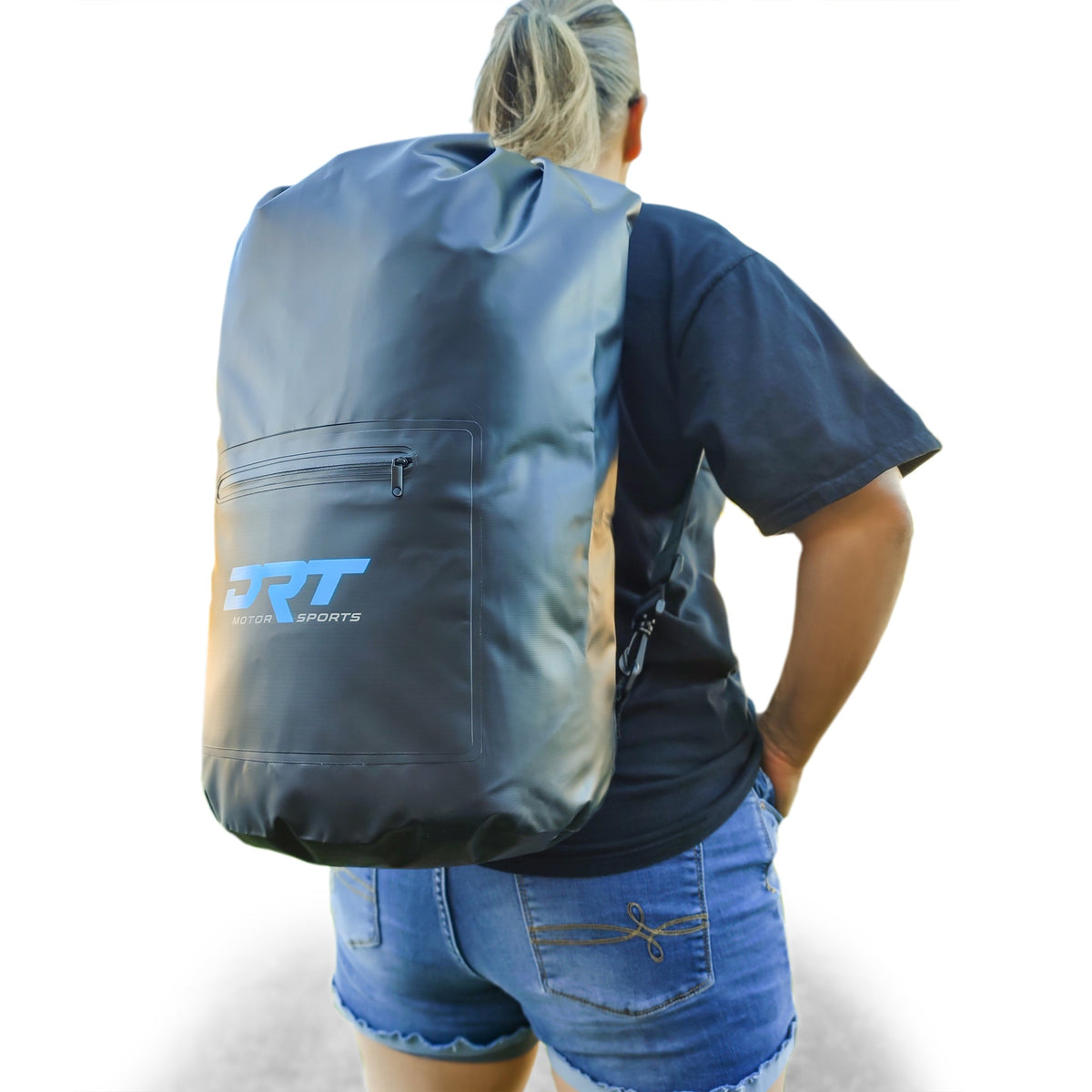 DRT 30-liter waterproof dry bag worn as a backpack, showing its size and side profile.