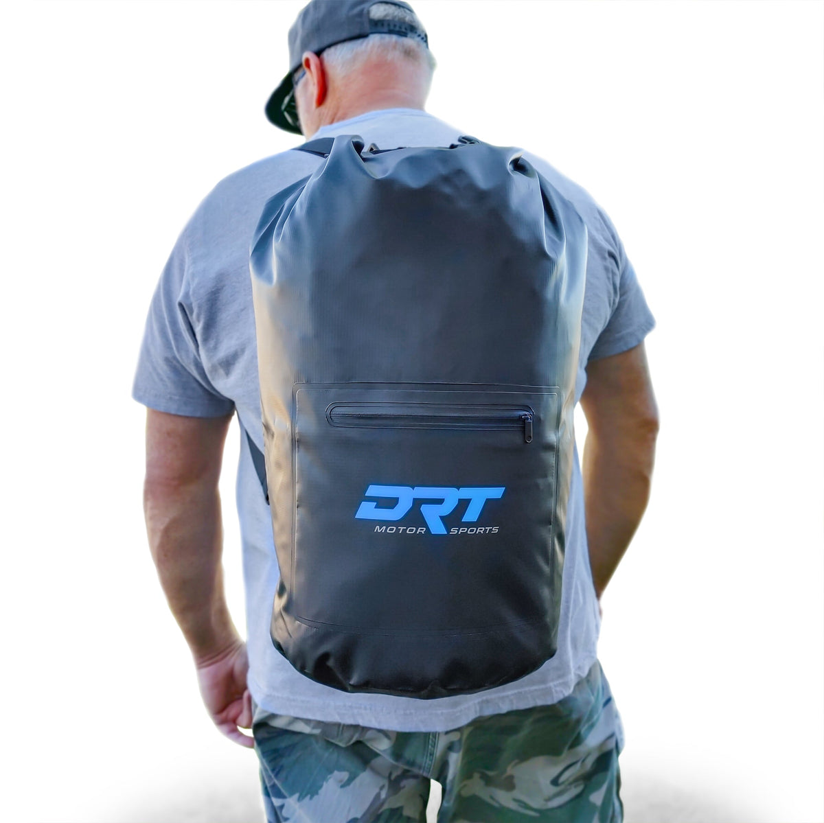 Rear view of the DRT 30-liter waterproof dry bag worn with both shoulder straps, showing the outer zipper pouch.