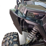 Close-up of a DRT full-coverage ABS rear fender installed beside the RZR tail light and rear tire.