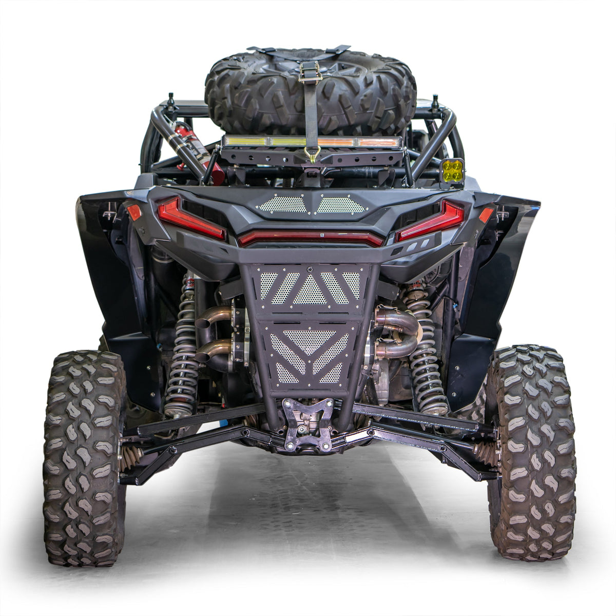 Rear view of DRT full-coverage ABS fenders installed on a Polaris RZR XP, showing rear tire coverage.