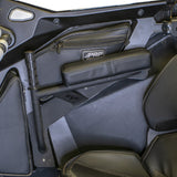 DRT rear-door armrest installed beside a PRP door bag in a Polaris RZR Pro Series cabin