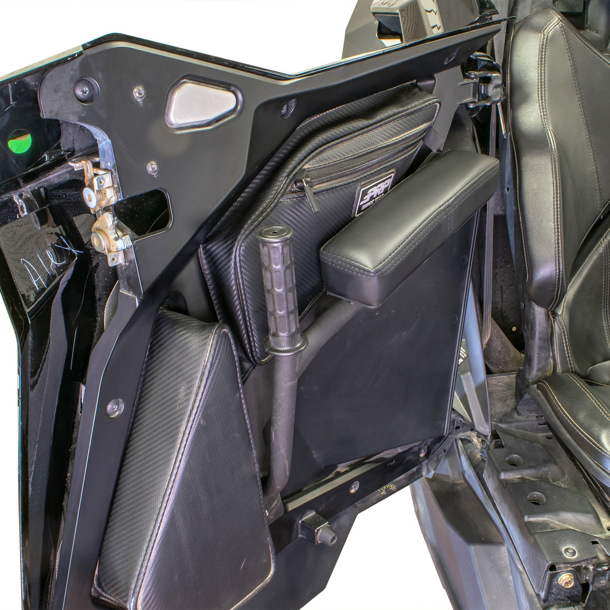 Close-up of DRT rear-door armrest and mounting position inside a Polaris RZR Pro Series cabin
