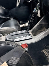 DRT Pro Series shifter gate and Grip Shifter V2.0 installed together in a Polaris RZR center console on an Addiction Powersports customer build; products sold separately.