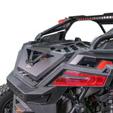 Rear three-quarter view of the DRT RZR adventure rack installed over the cargo bed.