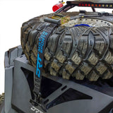 DRT RZR adventure rack installed with a spare tire secured above the rear cargo bed.