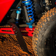 HCR mud flap mounted ahead of a Can-Am Maverick X3 rear tire
