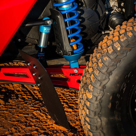 HCR mud flap mounted ahead of a Can-Am Maverick X3 rear tire