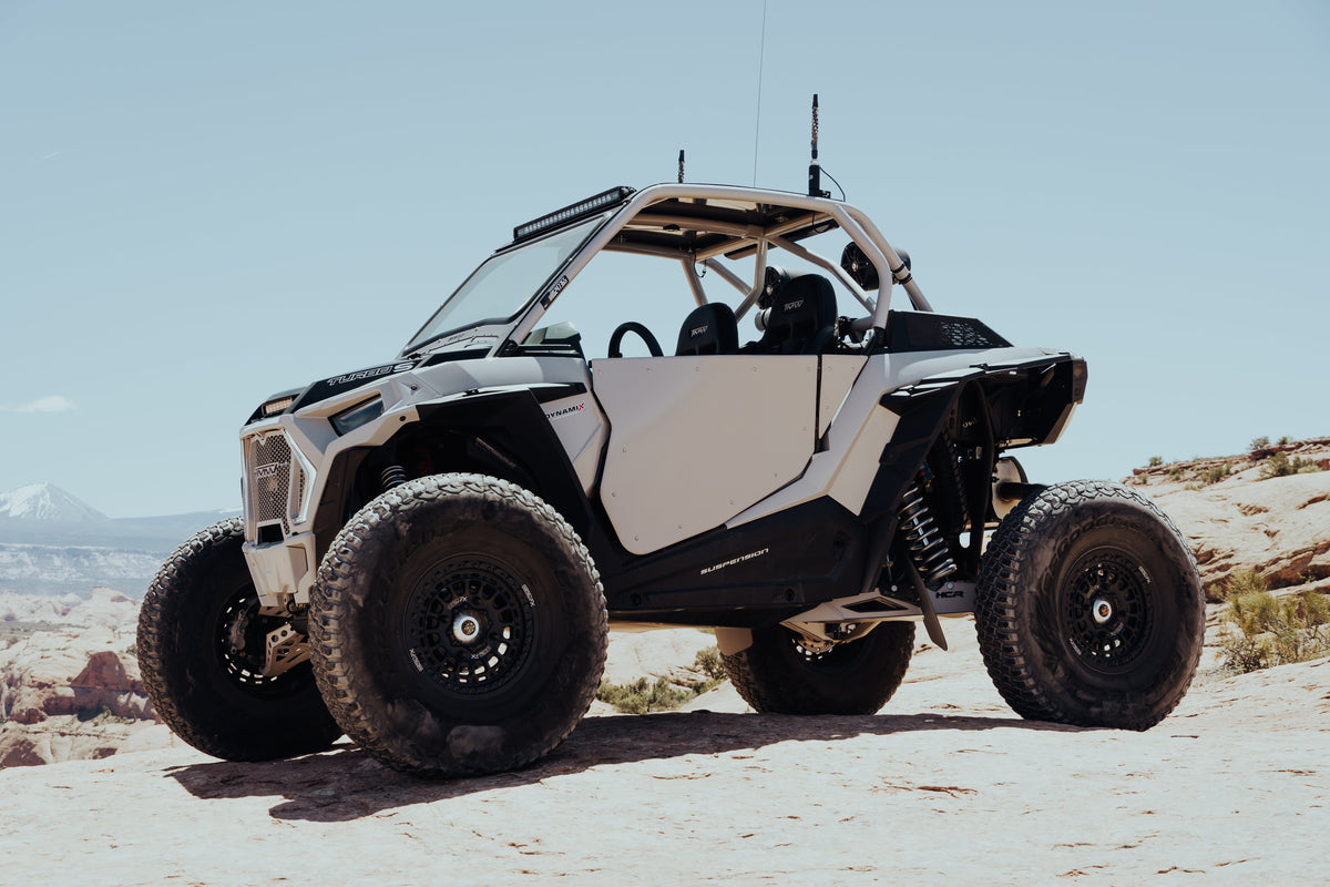 Polaris RZR Turbo S with HCR high-clearance rear trailing arms