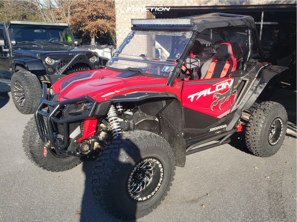 Hostile H316 Jigsaw Beadlock wheels installed on a red 2019 Honda Talon 1000X. Owner build via Function Powersports.