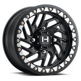 Hostile H316 Jigsaw Beadlock UTV wheel in Asphalt satin black — angled 4-lug view