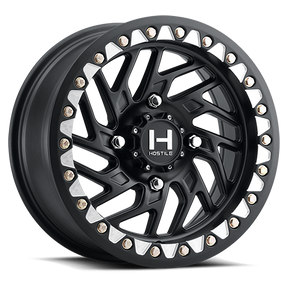 Hostile H316 Jigsaw Beadlock UTV wheel in Asphalt satin black — angled 4-lug view