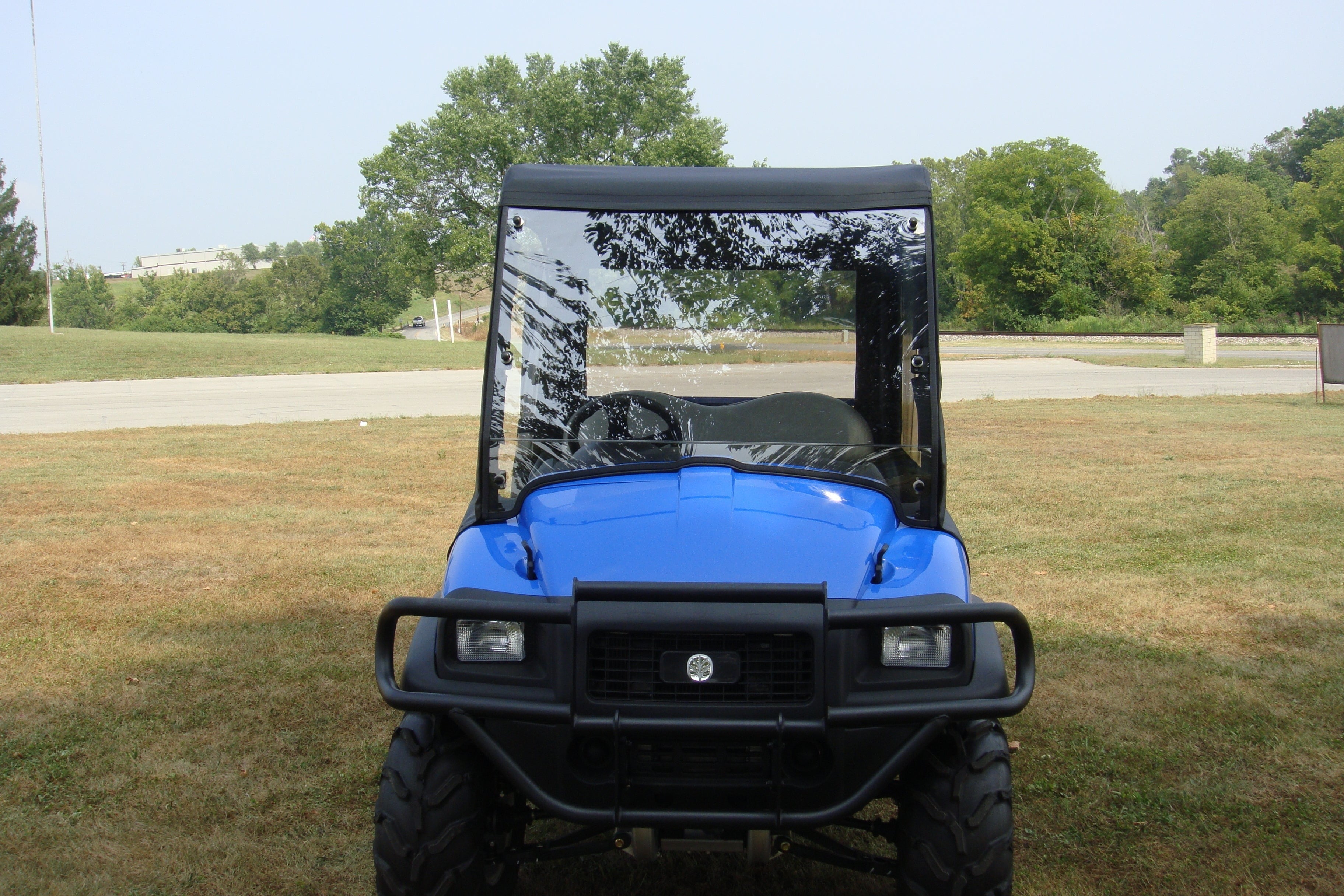 Photo of New Holland Rustler 115 - 2 Piece Vented Windshield w/Clamp Options by 3 Star UTV - Premium Windshields for UTVs / Side by Sides