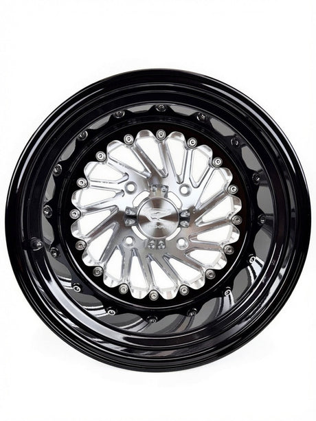 Angled view of a Packard Cyclone silver non-beadlock UTV wheel with a black barrel.