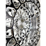 Close-up of a Packard Impact silver beadlock UTV wheel with a polished barrel.