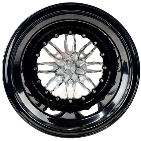 Angled view of a Packard Icon silver non-beadlock UTV wheel with a black barrel.