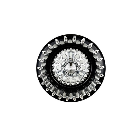 Angled view of a Packard Apollo silver beadlock UTV wheel with a black barrel.