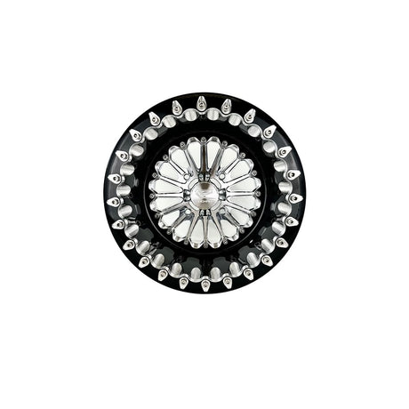 Angled view of a Packard Element silver beadlock UTV wheel with a black barrel.