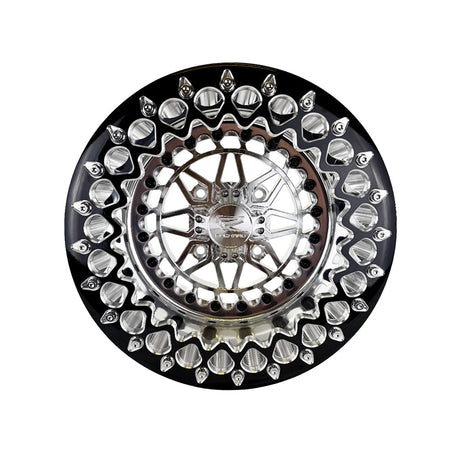 Angled view of a Packard Apollo silver beadlock UTV wheel with a polished barrel.