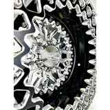Close-up of a Packard Impact silver beadlock UTV wheel with a black barrel.