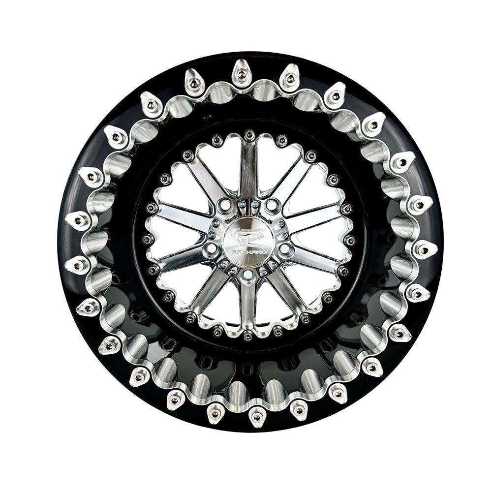 Front view of a Packard Element silver beadlock UTV wheel with a black barrel.
