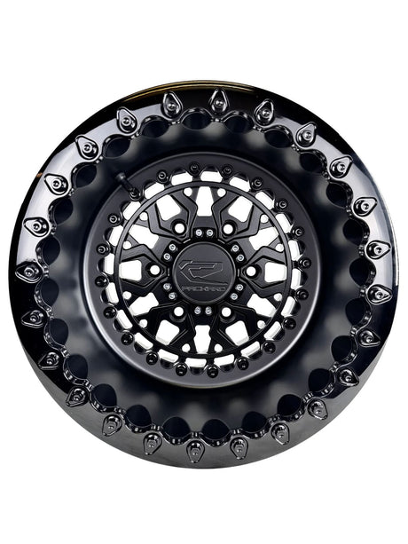 Angled view of a Packard Apollo Midnight beadlock UTV wheel with a satin black barrel.