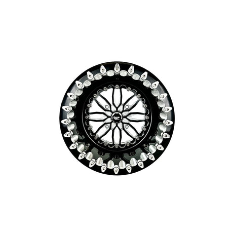 Angled view of a Packard Icon gloss black beadlock UTV wheel with a black barrel.