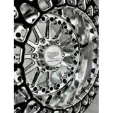 Close-up of a Packard Element silver beadlock UTV wheel with a polished barrel.