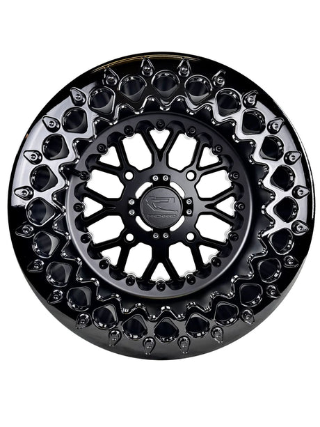 Angled view of a Packard Wishbone Midnight beadlock UTV wheel with a satin black barrel.