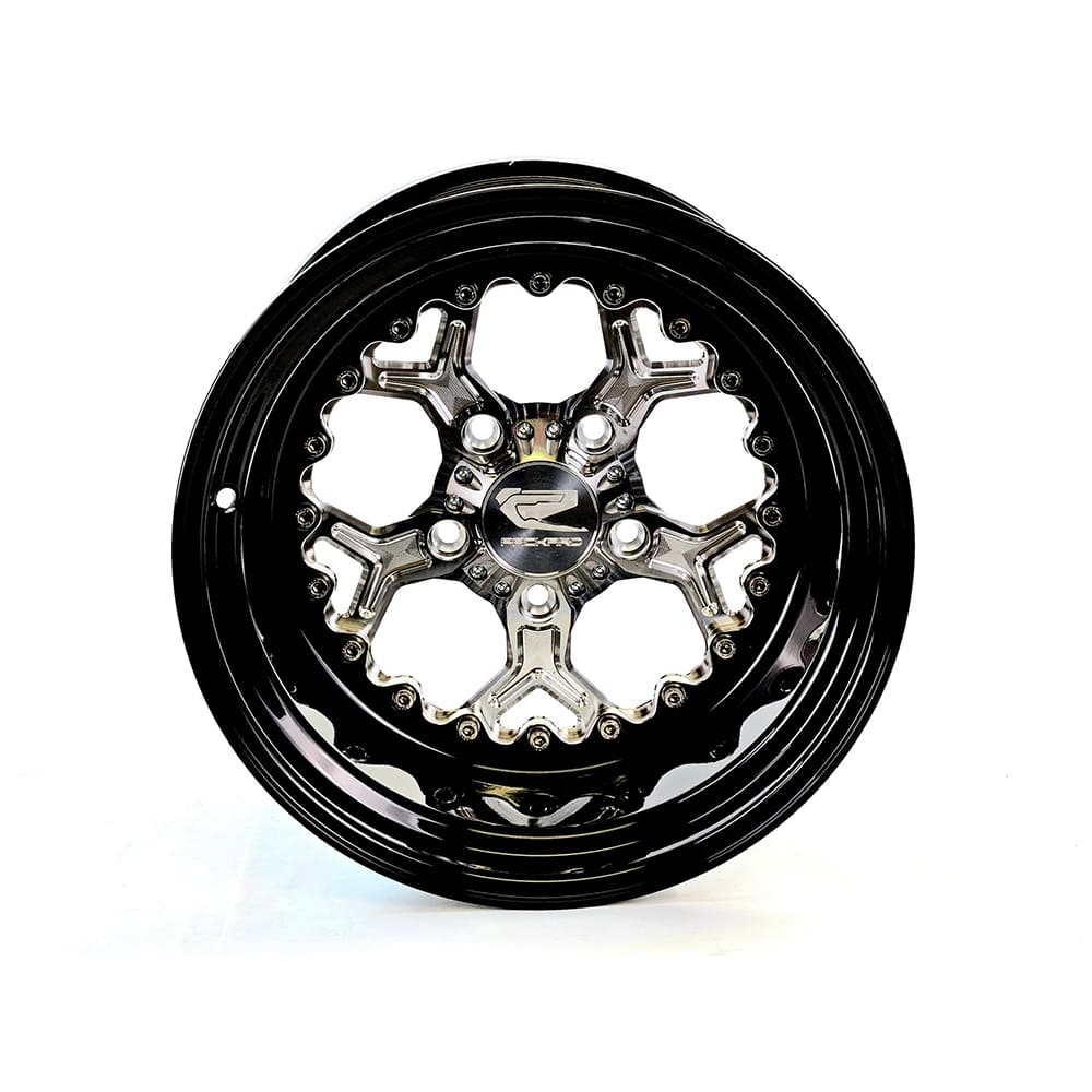 Angled view of a Packard Pro 5 silver non-beadlock UTV wheel with a black barrel.