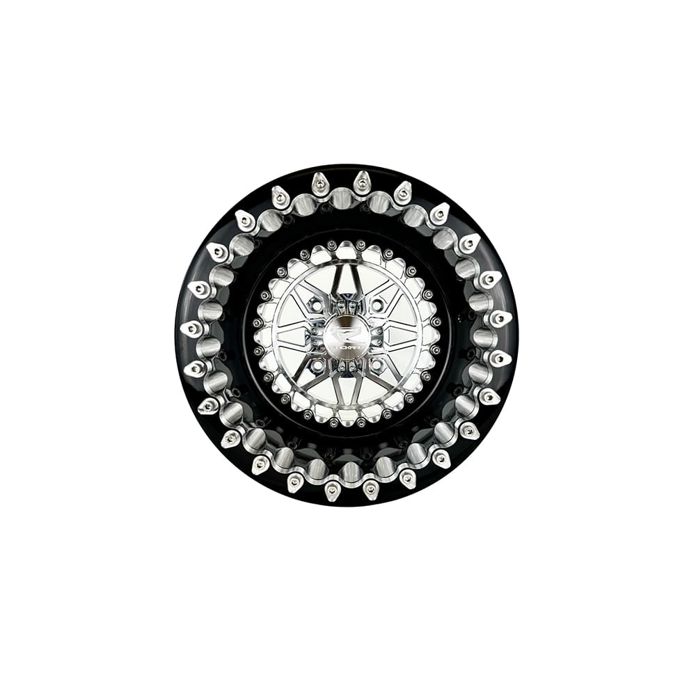 Front view of a Packard Apollo silver beadlock UTV wheel with a black barrel.
