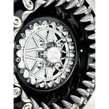 Close-up of a Packard Apollo silver beadlock UTV wheel with a black barrel.