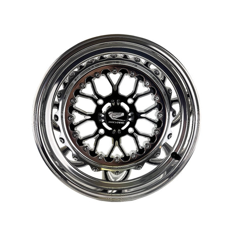 Angled view of a Packard Wishbone gloss black non-beadlock UTV wheel with a polished barrel.