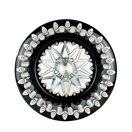 Angled view of a Packard Impact silver beadlock UTV wheel with a black barrel.