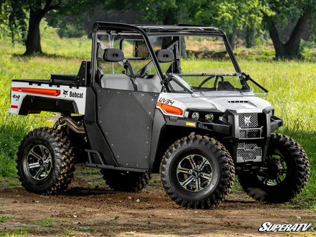Photo of SuperATV Bobcat UV34 Scratch-Resistant Flip Down Windshield by SuperATV - Premium Windshields for UTVs / Side by Sides
