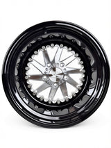 Front view of a Packard Cyclone silver non-beadlock UTV wheel with a black barrel.