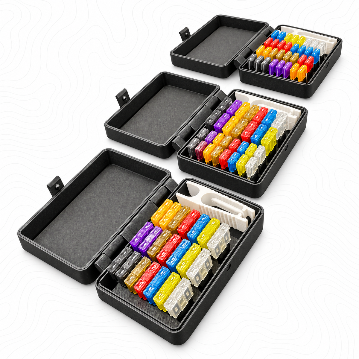 Angled view of three R1 fuse kits on white topography background