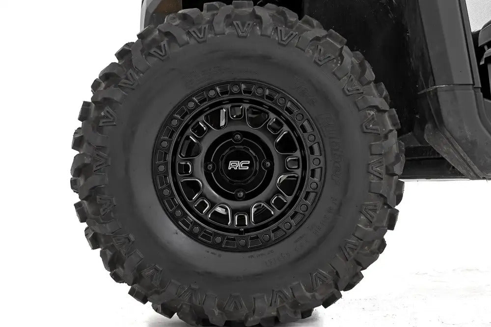 Photo of Rough Country Semi Gloss Black 14x7/4x137 One Piece 82 Series Wheel by Rough Country - Premium for UTVs / Side by Sides