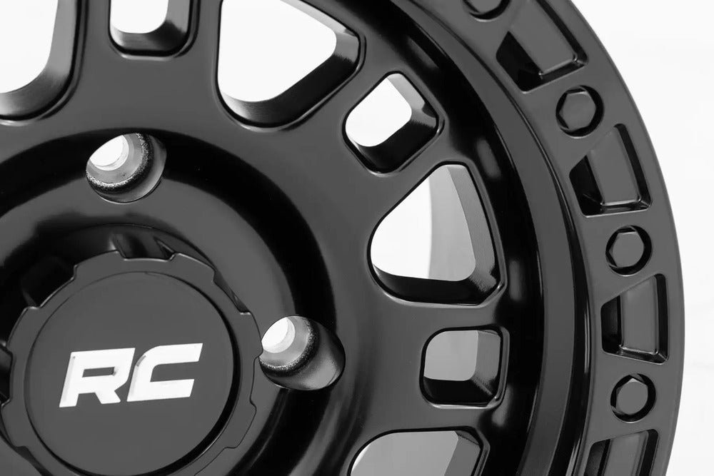 Photo of Rough Country Semi Gloss Black 14x7/4x137 One Piece 82 Series Wheel by Rough Country - Premium for UTVs / Side by Sides