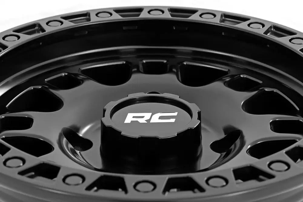 Photo of Rough Country Semi Gloss Black 14x7/4x137 One Piece 82 Series Wheel by Rough Country - Premium for UTVs / Side by Sides