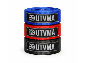 Rolled UTV recovery tow straps in black, blue and red