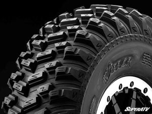 SuperATV Standard XT Warrior Tires 35x10x15 on 15x7 Assault Industries Hellfire Satin Black Wheels 4/136 Pattern