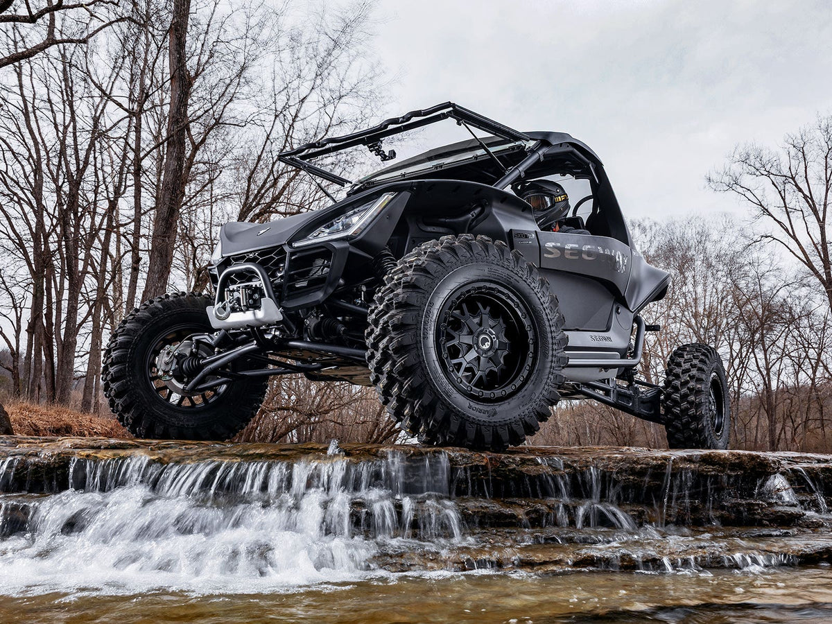 Standard XT Warrior Tires 30x10x15 on 15x10 Assault Industries Hellfire Matte Titanium Wheels 4/136 Pattern