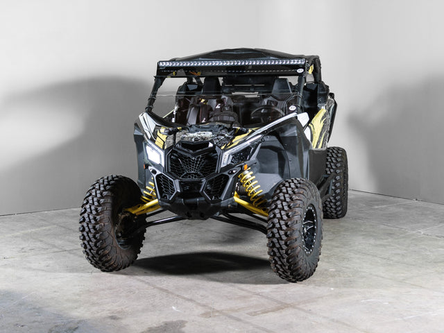 Photo of Can-Am Maverick X3 No Intrusion Half UTV Windshield 1/4" Scratch Resistant with Tinted Visor by UTV Windshields - Premium Windshields for UTVs / Side by Sides