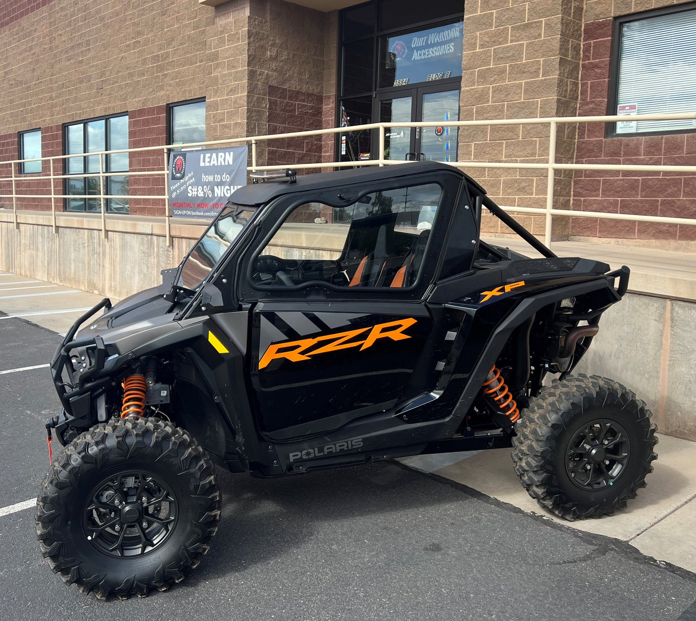 Photo of Polaris RZR 1000XP 2024 2-Seat Cab Enclosure - THE VAULT All-Weather Protection by DWA - Premium Cab Enclosures for UTVs / Side by Sides