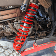 Polaris General XP replacement tender springs shown with factory main springs
